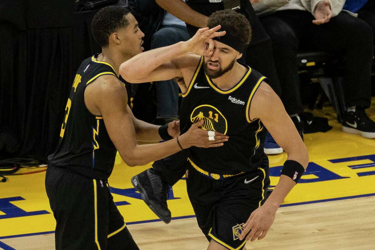 Golden State Warriors’ guard Klay Thompson reacts after scoring a basket during the second quarter of his Game 1 of a NBA basketball first-round playoff series against Denver Nuggets in San Francisco, Calif. Saturday, April 16, 2022.