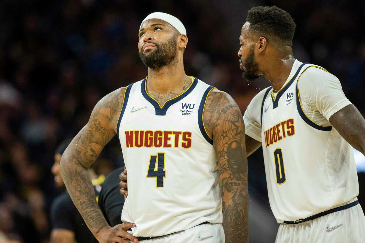 Denver Nuggets’ center DeMarcus Cousins reacts after being rejected during the fourth quarter in Game 1 of a NBA basketball first-round playoff series against the Golden State Warriors in San Francisco, Calif. Saturday, April 16, 2022. The Warriors defeated the Nuggets 123-107.