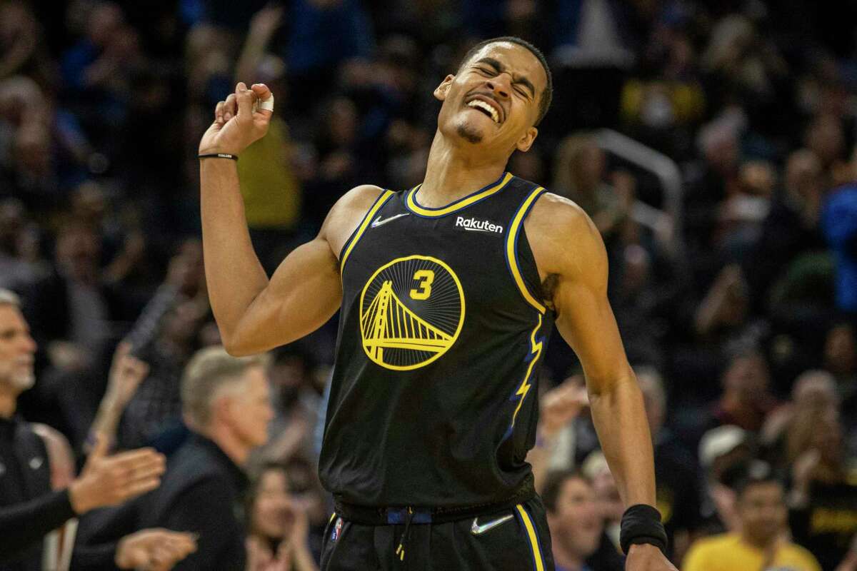 Golden State Warriors’ guard Jordan Poole reacts during the third quarter in Game 1 of a NBA basketball first-round playoff series against the Denver Nuggets in San Francisco, Calif. Saturday, April 16, 2022. The Warriors defeated the Nuggets 123-107.