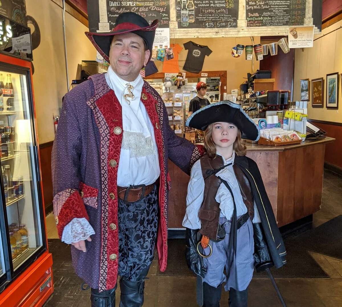 Huckleberry Finn Marshall, right, pictured here with his father, Richard Marshall, enjoys dressing as a pirate and attending Renaissance Fairs with his parents. These costumes were displayed a couple of years ago.