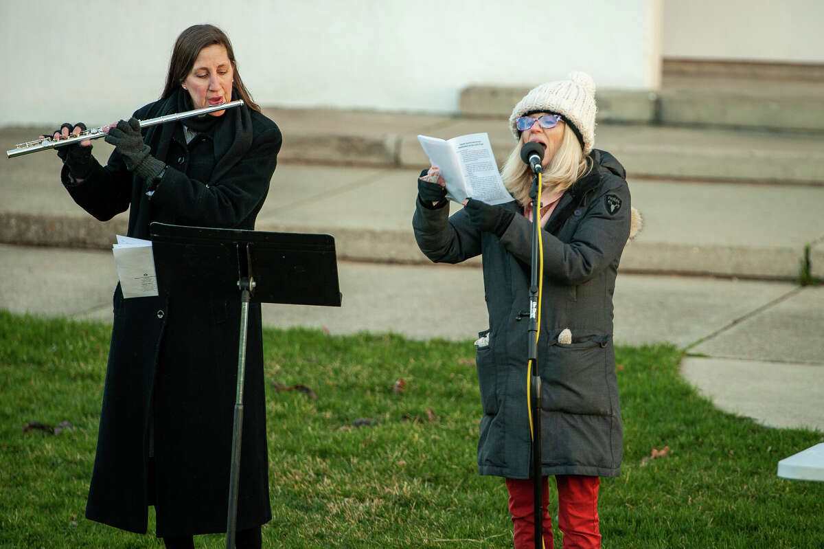 The Reverend Anita Hahn (left) and Heidi Kidd of the First United Methodist Church of Midland play music at the church's Easter Sunrise Service on April 17, 2022 at the Central Park Bandshell.
