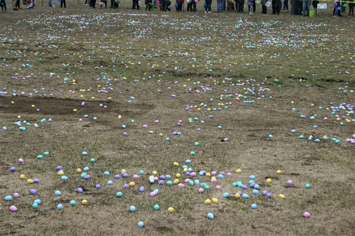 Cold, wind and even a little snow didn't keep the crowds from descending on the Evart High School grounds for the annual Easter Egg Drop. Weather prevented the helicopter from dropping eggs, but that didn't dampen the spirt as kids of all ages scrambled to collect thousands of candy-filled eggs scattered about the ground.