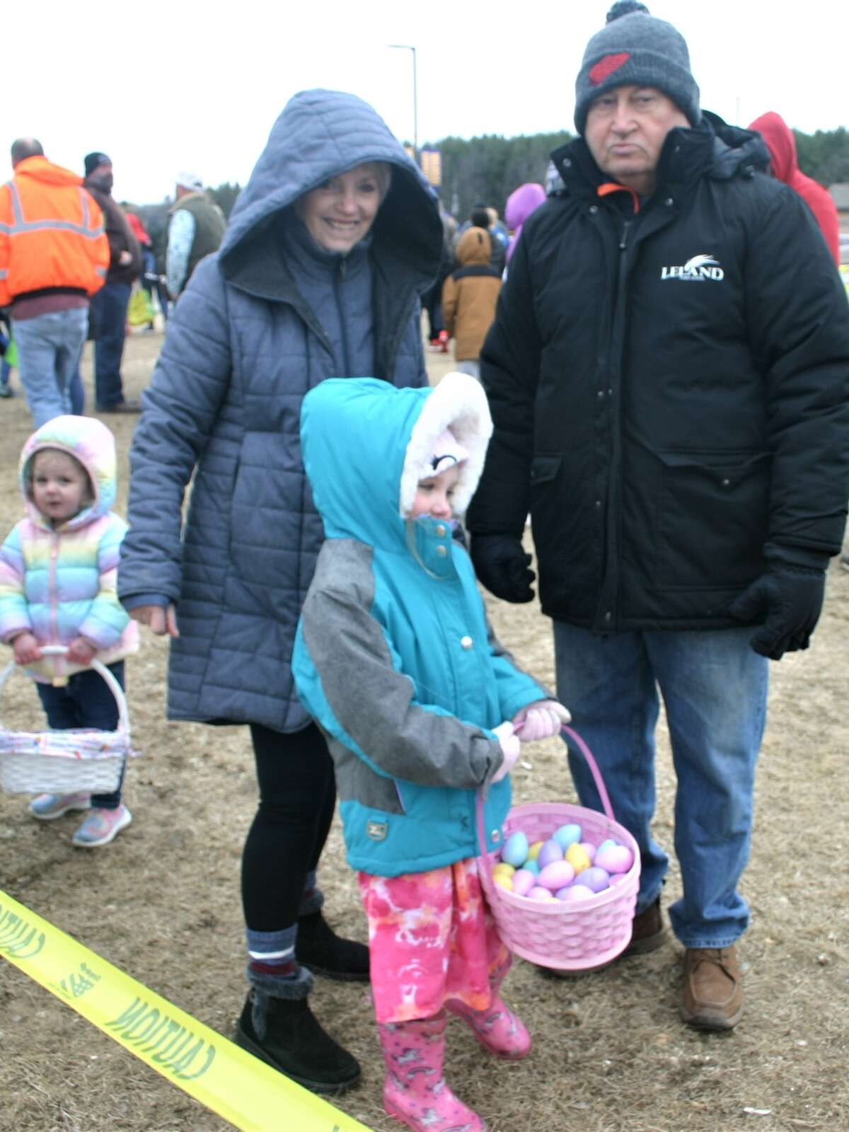 Cold, wind and even a little snow didn't keep the crowds from descending on the Evart High School grounds for the annual Easter Egg Drop. Weather prevented the helicopter from dropping eggs, but that didn't dampen the spirt as kids of all ages scrambled to collect thousands of candy-filled eggs scattered about the ground.