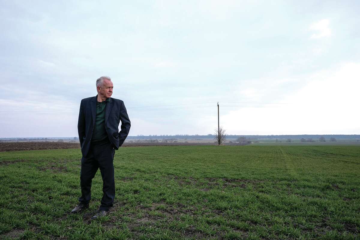 Ivan Kilgan, head of the regional agricultural association village, shows his fields of wheat, in Luky village, western Ukraine, Friday, March 25. The northwestern Lviv region near the border with Poland, far from the heart of what is known as Ukraine's breadbasket in the south, is being asked to plant all the available fields it can, said Kilgan.