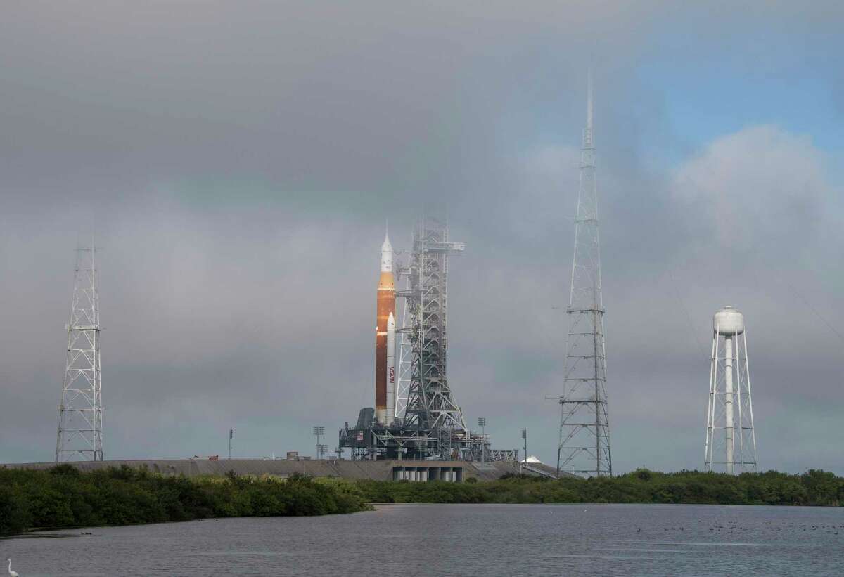 NASA's Space Launch System rocket with the Orion spacecraft aboard is seen atop at Launch Complex 39B, Friday, March 18, 2022, after being rolled out to the launch pad for the first time at NASA's Kennedy Space Center in Florida.