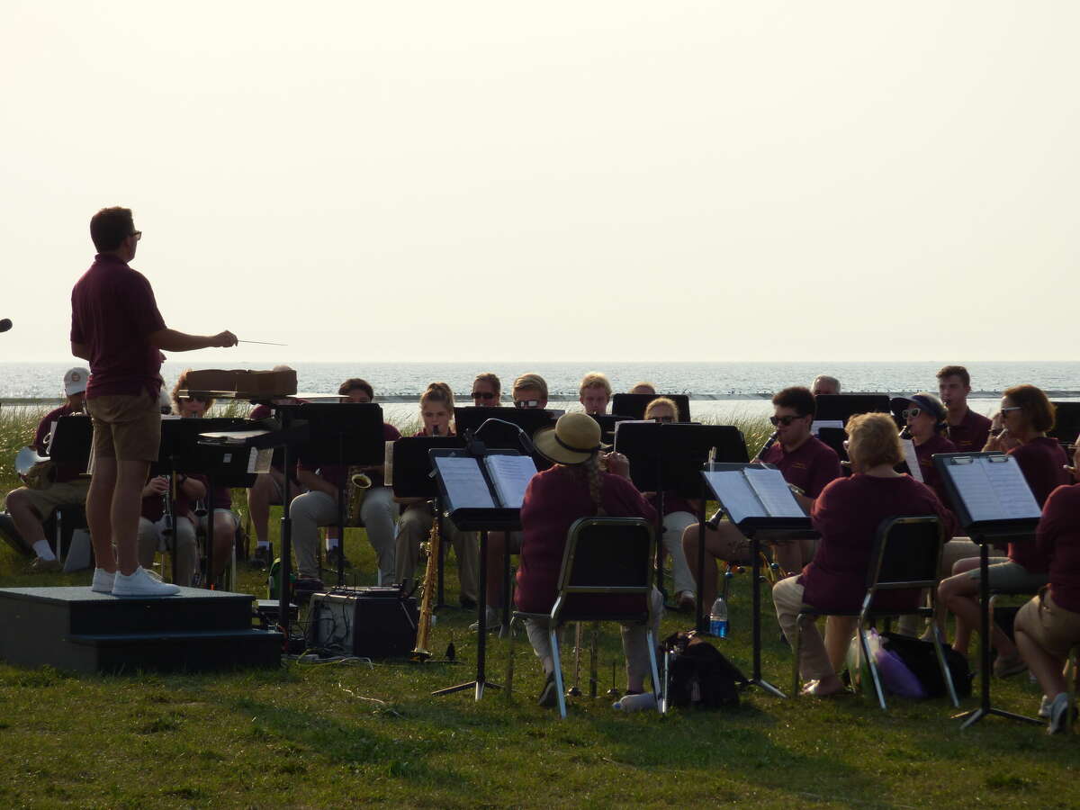 In this file photo, the Manistee Community Band performs on Aug. 10 at First Street Beach in Manistee. The group will be adding a chamber choir to its performances this summer.