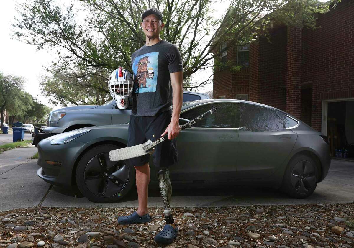 Army veteran and Paralympian Horitius Jen Lee stands near his car, which was broken into Saturday by a thief who stole his three gold medals, earned in three Olympics as a member of the U.S. hockey sled team. Lee’s appeals on social media for their return were amplified by SAPD Chief William McManus. By Sunday night, the medals and bag were dropped off at a fire station.