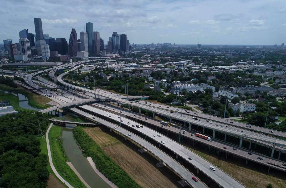 I-45, left, and Interstate 10 diverge as they cross White Oak Bayou north of downtown, seen on Friday, July 5, 2019, in Houston.