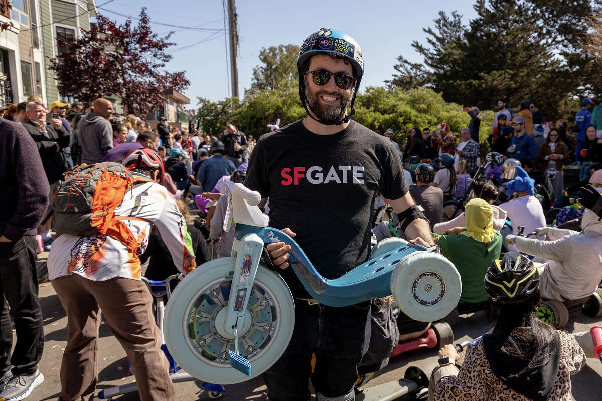 SFGATE culture editor Dan Gentile shows off his ride during Easter Sunday's Bring Your Own Big Wheel event on Vermont and 20th streets, in Potrero Hill. 