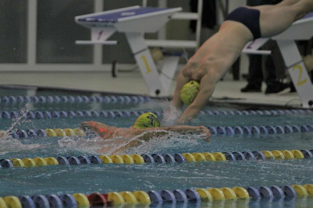 Manistee swim team shares accomplishments with school board