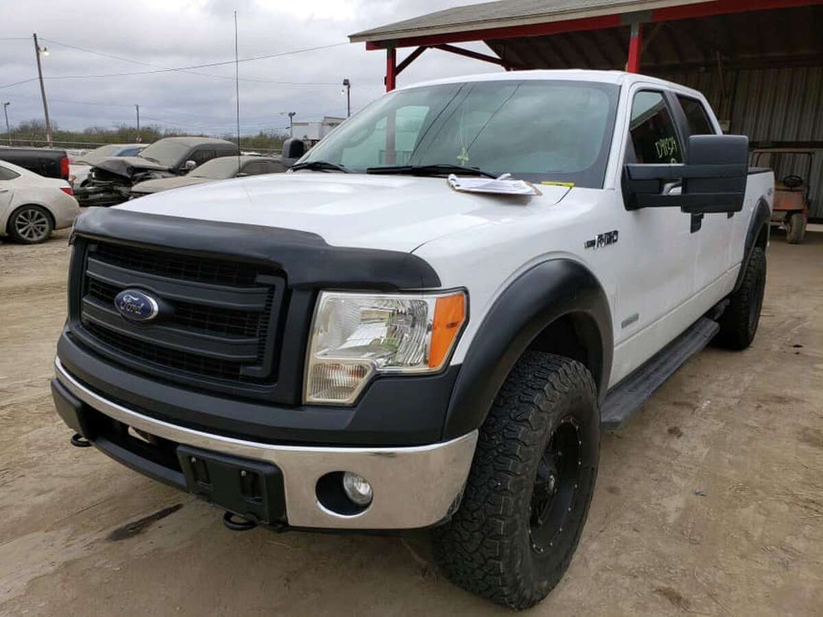 A white 2013 Ford F150 pickup truck is one of the 16 vehicles that the San Antonio police will auction off on Tuesday.