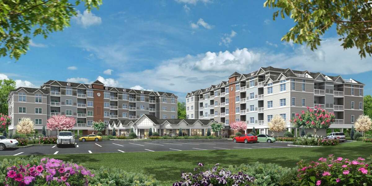 A rendering of the latest proposal for the corner of Petremont Lane and Coram Road. The development would have ground-level parking and four levels with 100 total apartments.