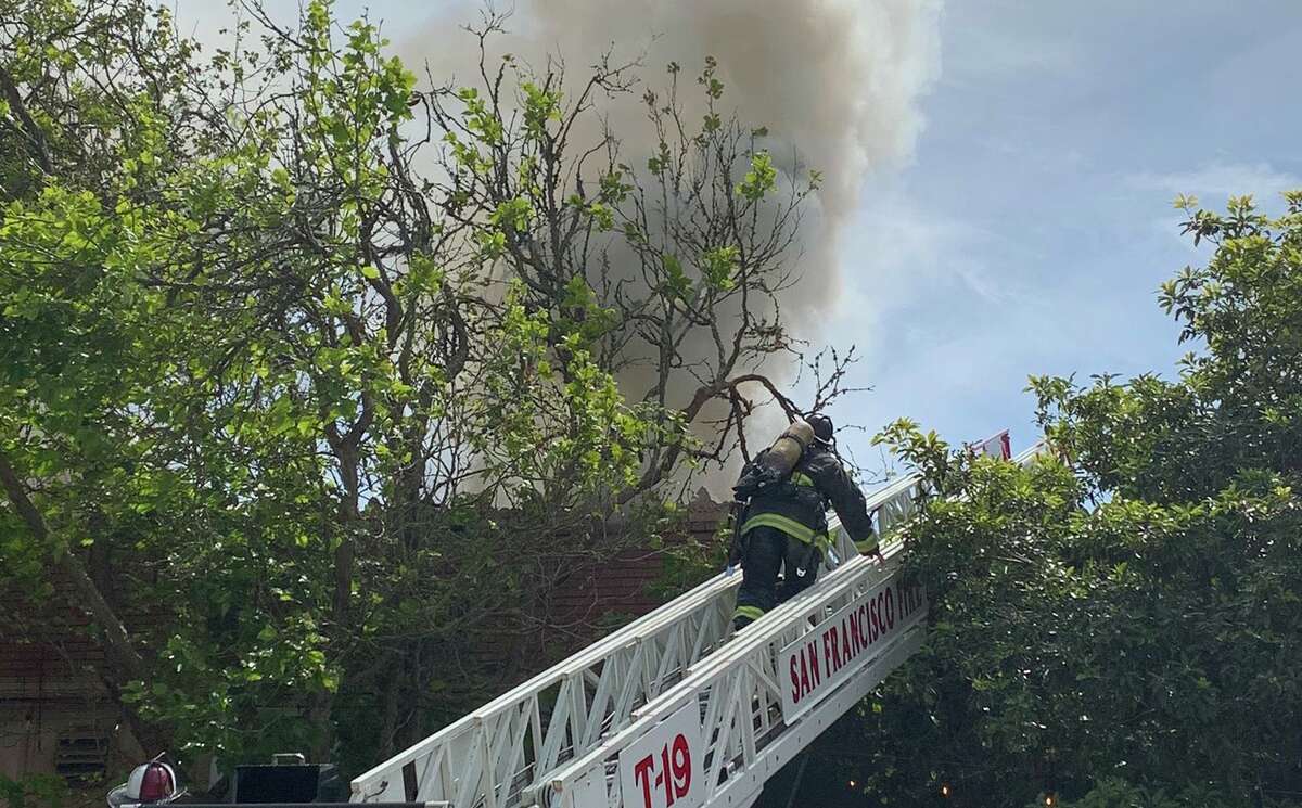 Firefighters were at the scene of a fire in San Francisco's West Portal neighborhood on Monday.