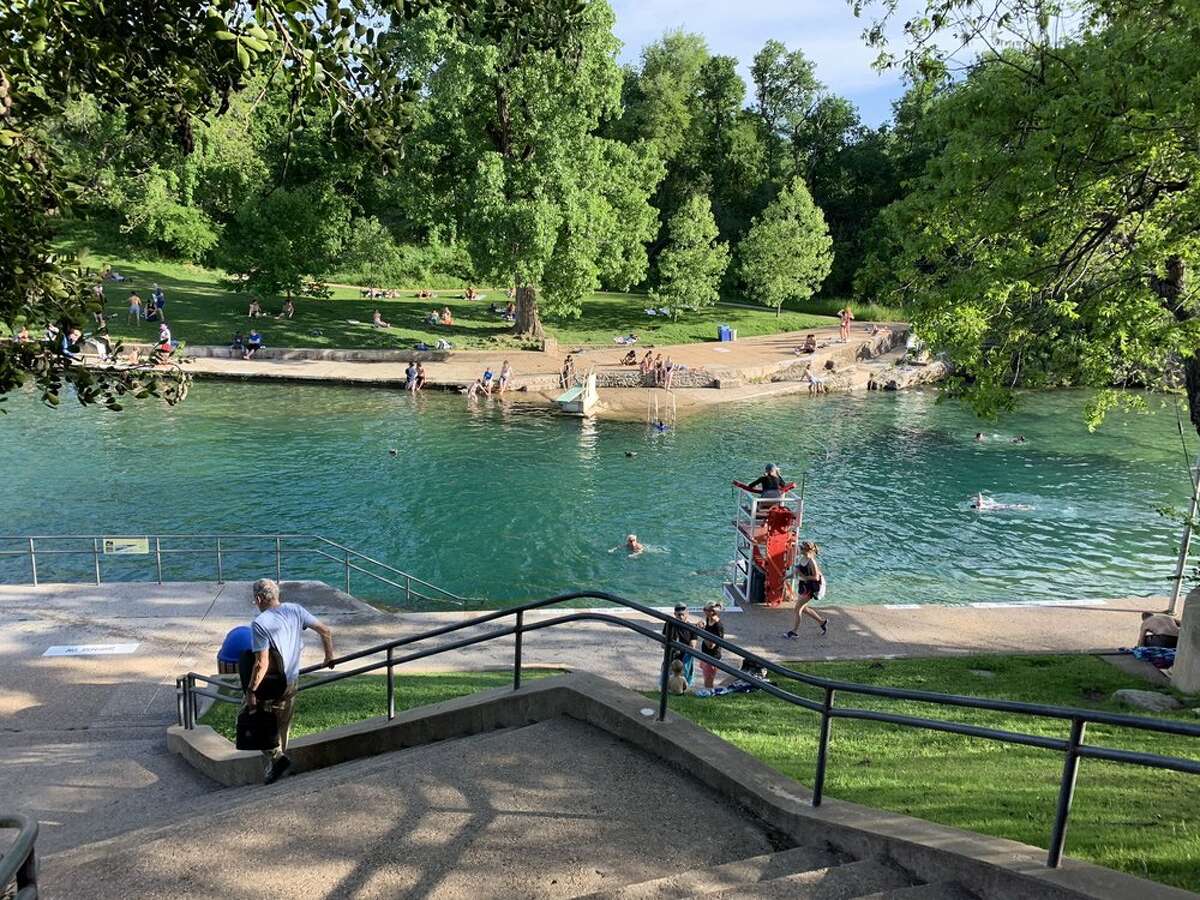 Barton Springs Pool is a spring-fed pool in Austin's Zilker Park.