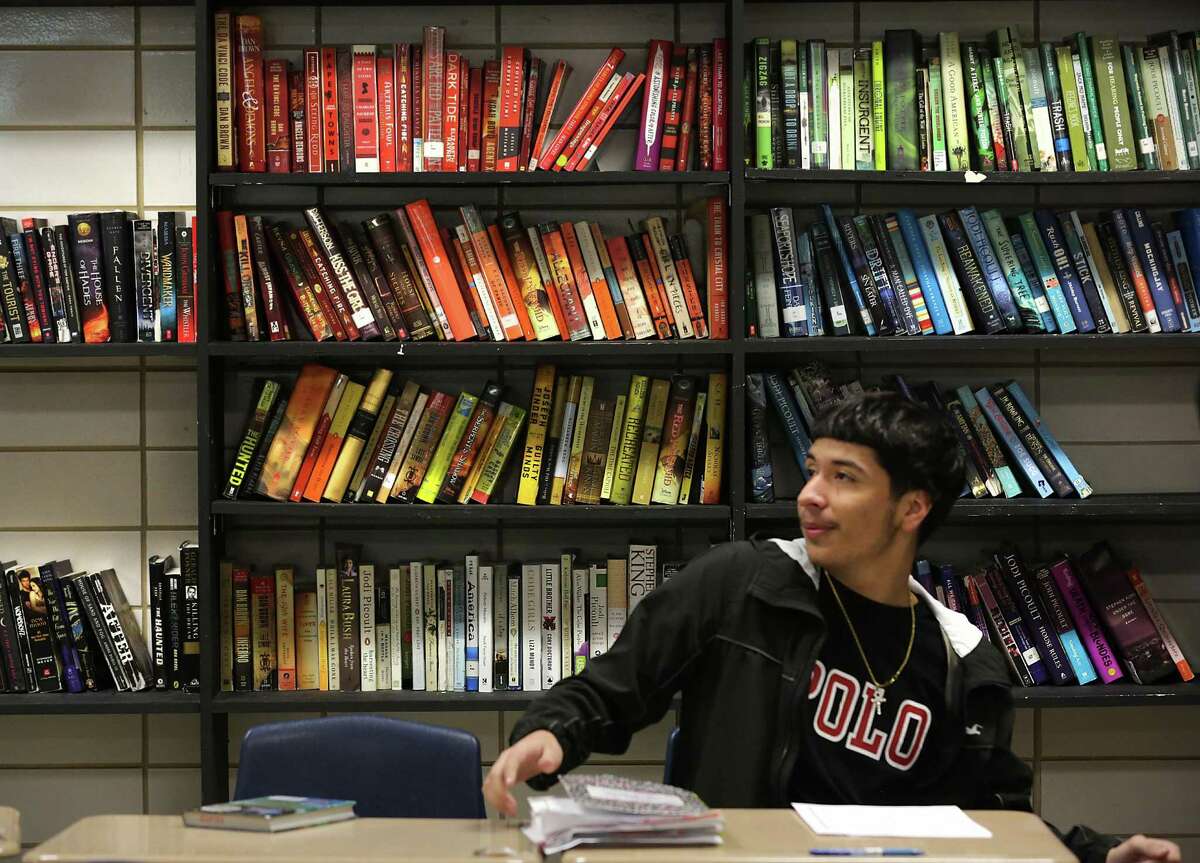 Juan Monsivaiz is in Christina Iltis’s English class at Southwest High School. With the slashing of school budgets many teachers are having to find other ways to provide liturature books for their students.