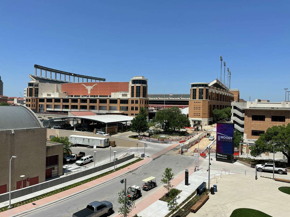 The Moody Center features a second-floor terrace, with views of DKR-Texas Memorial Stadium, the UT Tower, and the Texas Capitol.