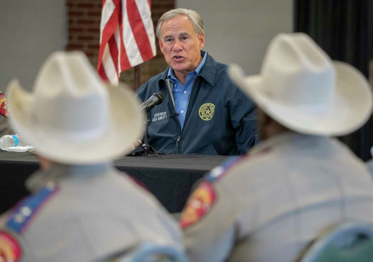 Texas Gov. Greg Abbott, joined by Texas DPS Director Steven McCraw and Midland County Sheriff David Criner, speaks with area law enforcement on border security on Nov. 4, 2021, at the Midland Horseshoe.