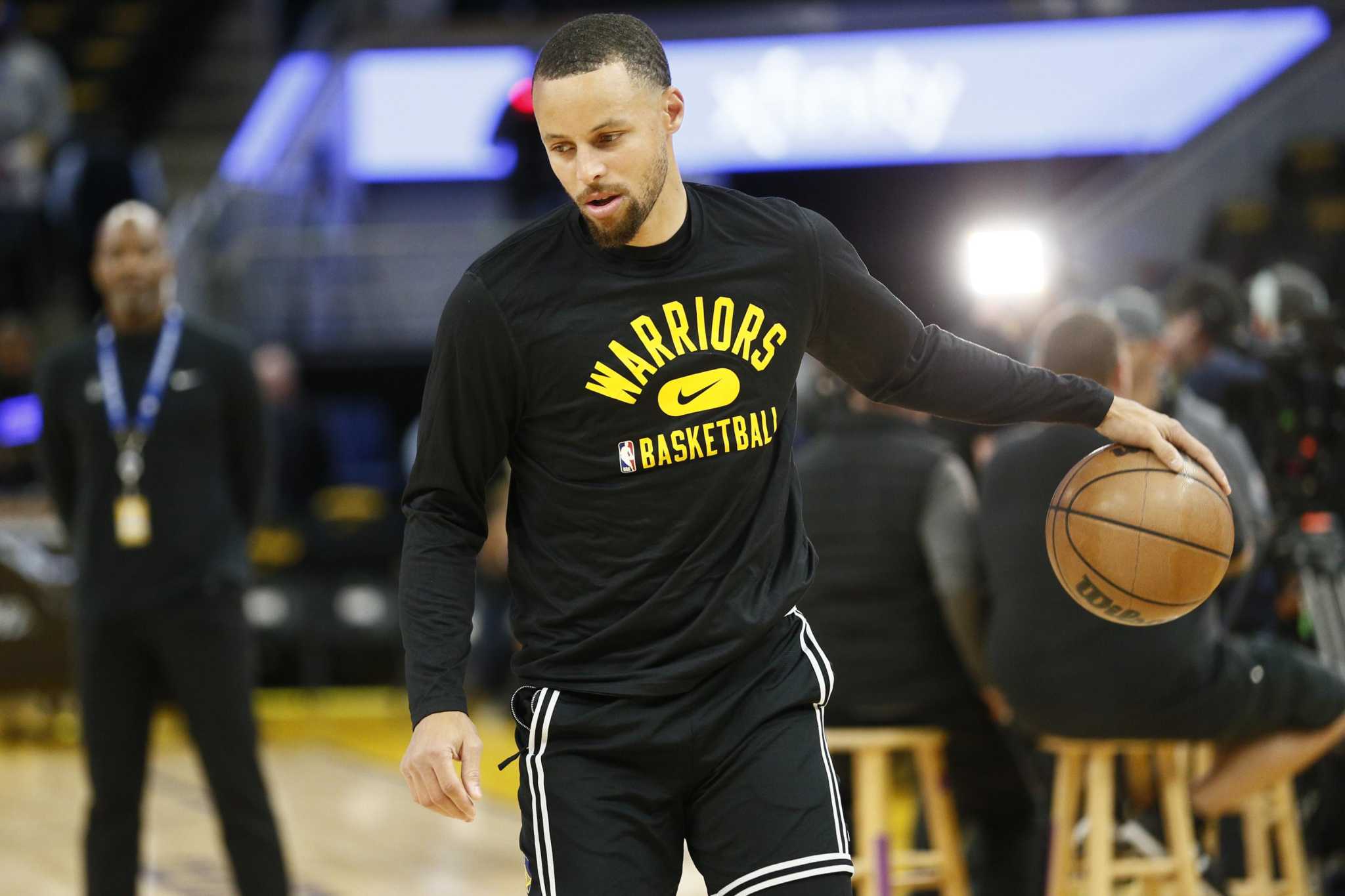 Warriors guard Stephen Curry was held out of the starting lineup again Mond...