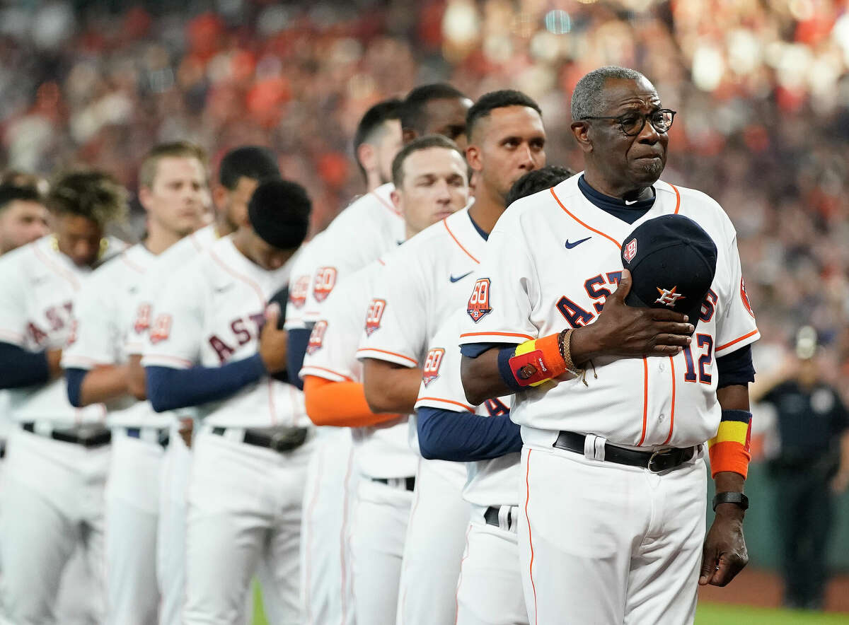 Houston Astros manager Dusty Baker Jr. (12) during National Anthem before the first inning of the Astros home opener MLB baseball game at Minute Maid Park on Monday, April 18, 2022 in Houston.