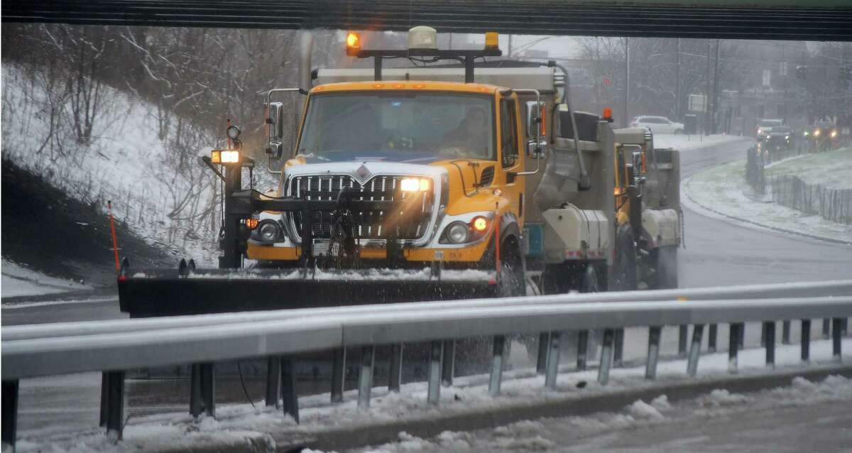 Heavy snow has left thousands without power in New England and New York 