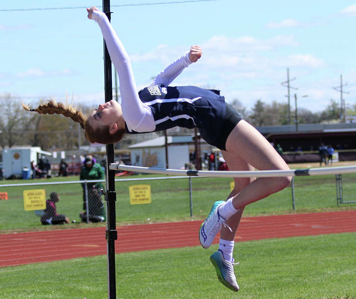 Father McGivney freshman Mia Range broke her own school record by clearing 5 feet, 3 3/4 inches to win the high jump at Monday's Roxana Relays. Range, shown in the high jump at the EA-WR Invite earlier this season, also won the long jump and 100 meters at Roxana.