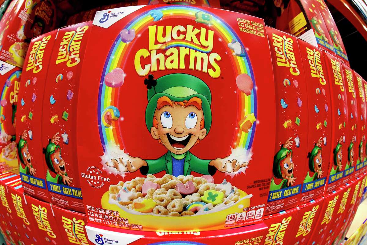 FILE - Boxes of General Mills' Lucky Charms cereal are seen on a shelf at a Costco Warehouse in Robinson Township, Pa., Thursday, May 14, 2020.