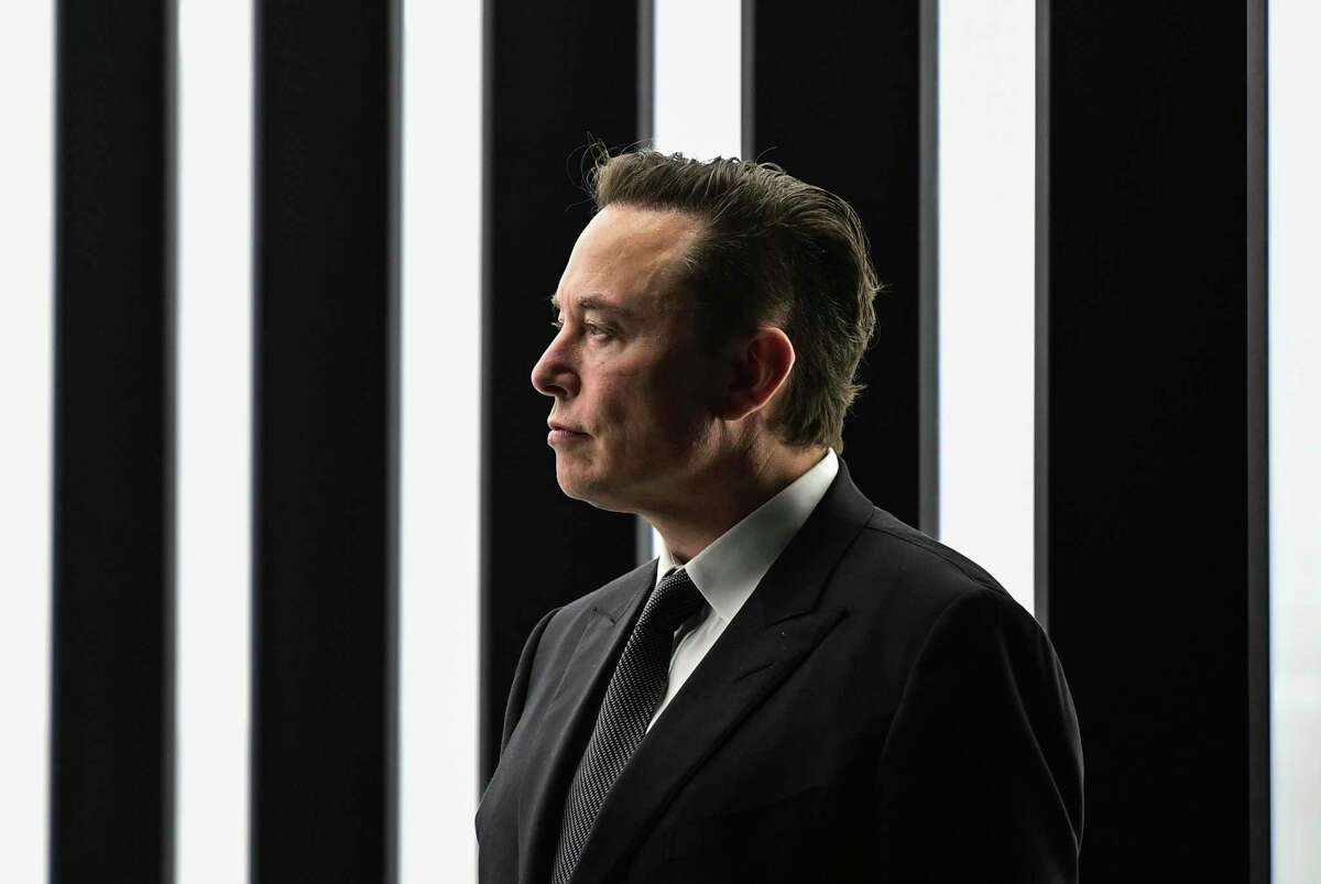 FILE - Elon Musk, Tesla CEO, attends the opening of the Tesla factory Berlin Brandenburg in Gruenheide, Germany, March 22, 2022. Twitter said in a statement Friday, April 15, 2022, that its board of directors has unanimously adopted a “poison pill” defense in response to Tesla CEO Elon Musk’s proposal to buy the company and take it private. (Patrick Pleul/Pool Photo via AP, File)