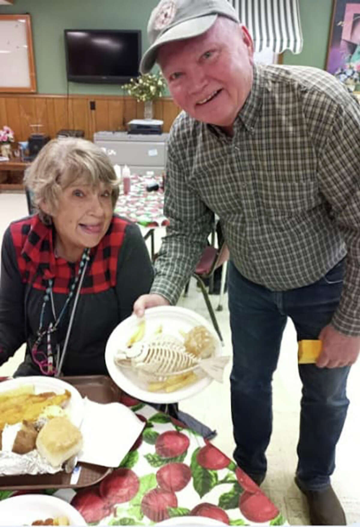 People enjoyed a light-hearted time catching up with other community members during the fish fry. Pictured left to right: Sue Brown-Haven and Knight Greg Freeman. 