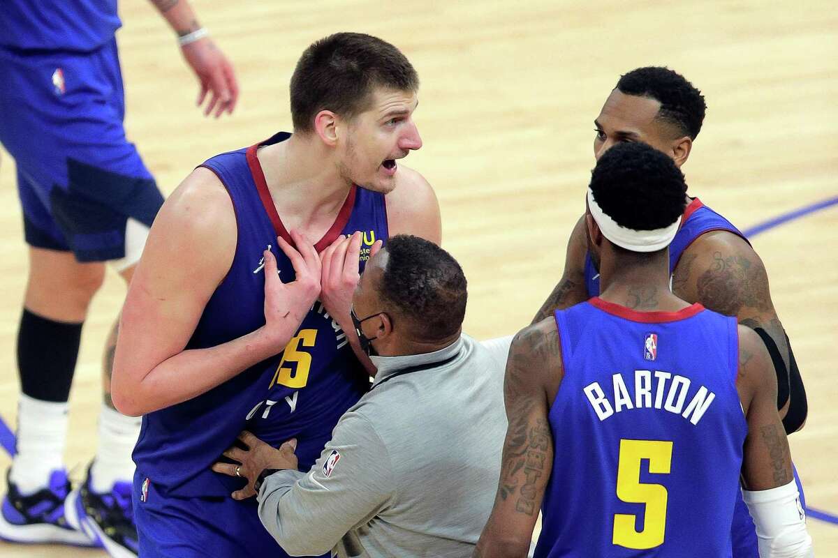Nikola Jokic (15) reacts to being ejected for his seond technical foul in the second half as the Golden State Warriors defeated the Denver Nuggets 126-106 in game 2 of the NBA Playoffs first round at Chase Center in San Francisco, Calif., on Monday, April 18, 2022.