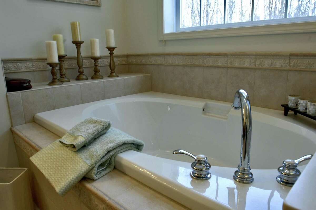 A nice soak in the tub with apple cider vinegar and Epsom salts can soothe the body.