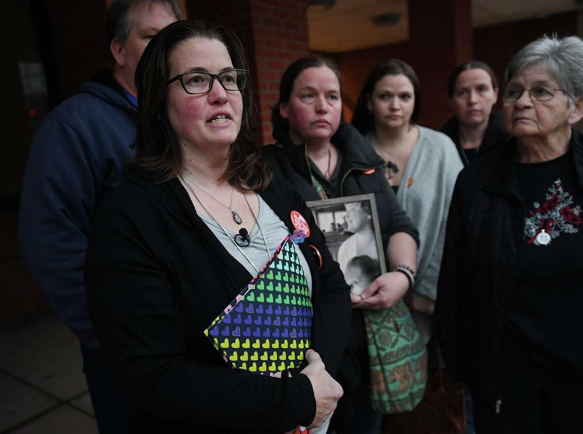 Surrounded by family, Jennifer Lawlor, left, mother of Emily Todd, speaks outside Superior Court following a plea hearing for accused murderer Brandon Roberts in Bridgeport, Conn. on Tuesday January 28, 2020.