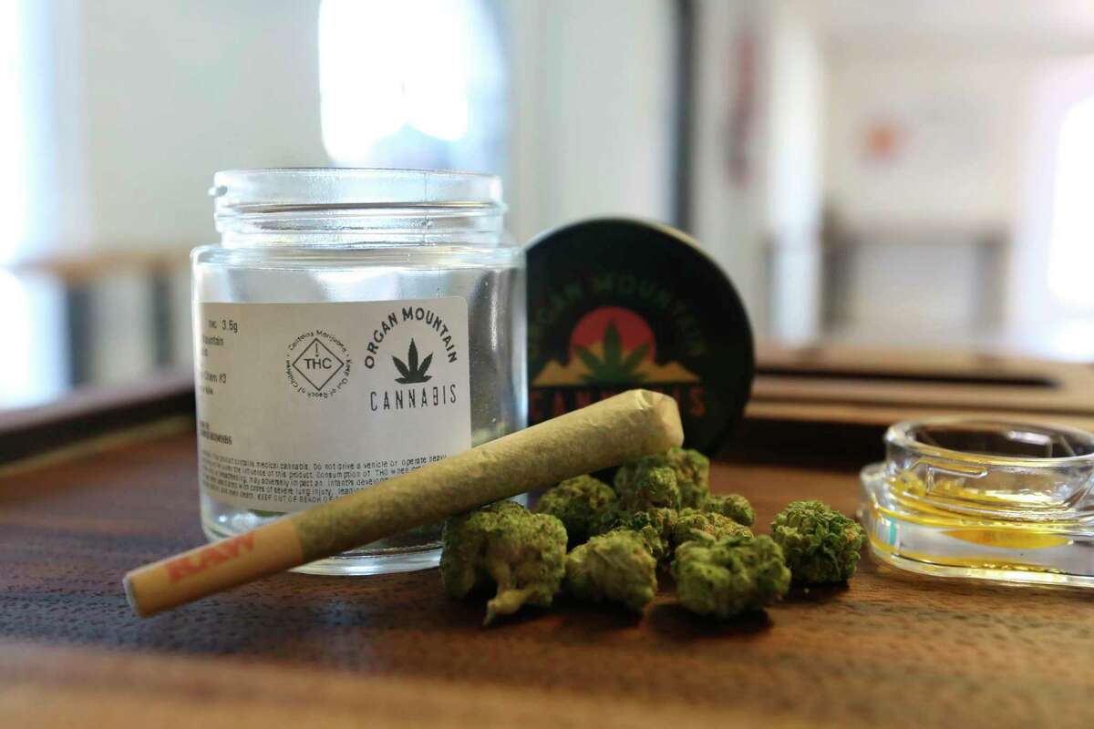 A pre-rolled joint and cannabis flower are pictured at Organ Mountain Cannabis, a new dispensary on Lohman Avenue in Las Cruces, N.M. on April 1, 2022, the first day of recreational sales in New Mexico. (Michael McDevitt/The Las Cruces Sun News via AP)