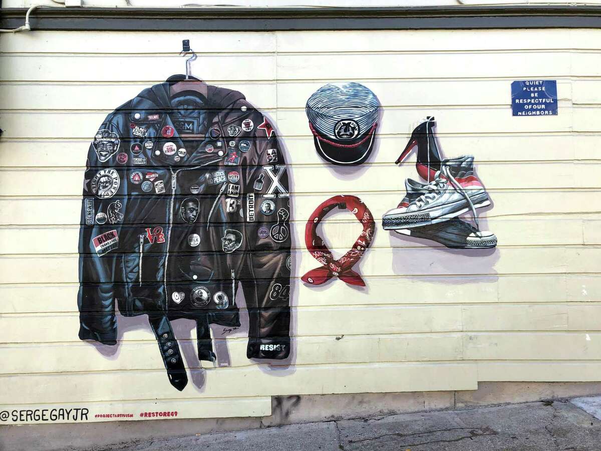 Artist Serge Gay Jr.'s mural on the Moby Dick bar in the Castro neighborhood depicts icons of LGBTQ and black culture.