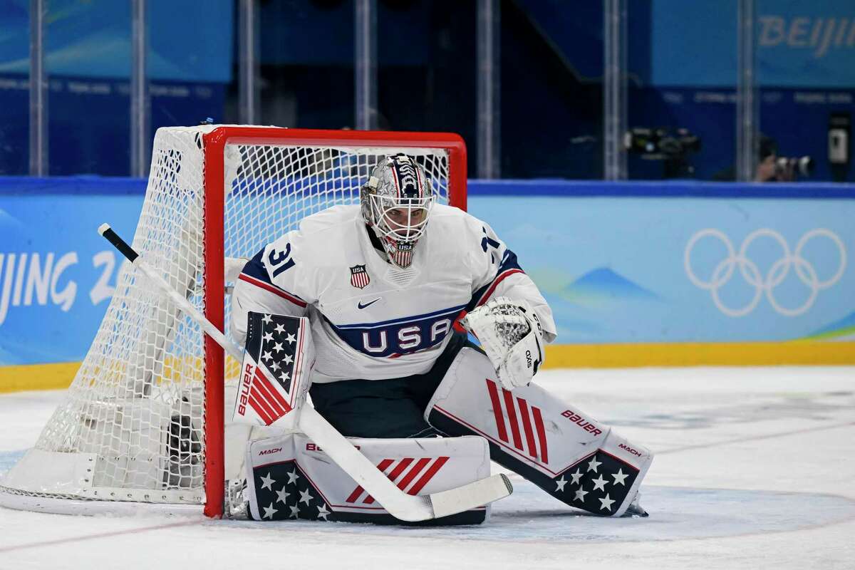 United States goalkeeper Strauss Mann of Greenwich plays against Canada during an Olympic preliminary game on Feb. 12 in Beijing. Mann, and Brunswick alum, signed his first NHL contract on Tuesday with the San Jose Sharks.