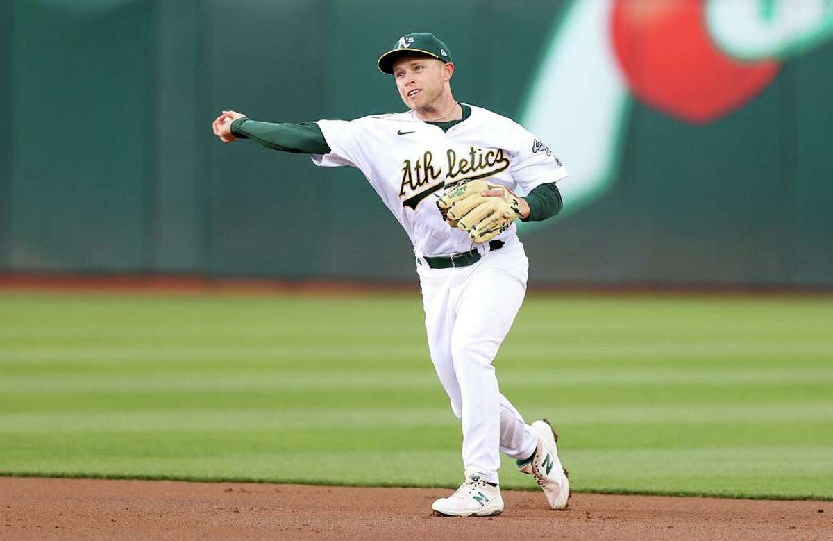 OAKLAND, CALIFORNIA - APRIL 19: Nick Allen #2 of the Oakland Athletics throws the ball to first base in the first inning against the Baltimore Orioles at RingCentral Coliseum on April 19, 2022 in Oakland, California. This is Allen's MLB debut. (Photo by Ezra Shaw/Getty Images)