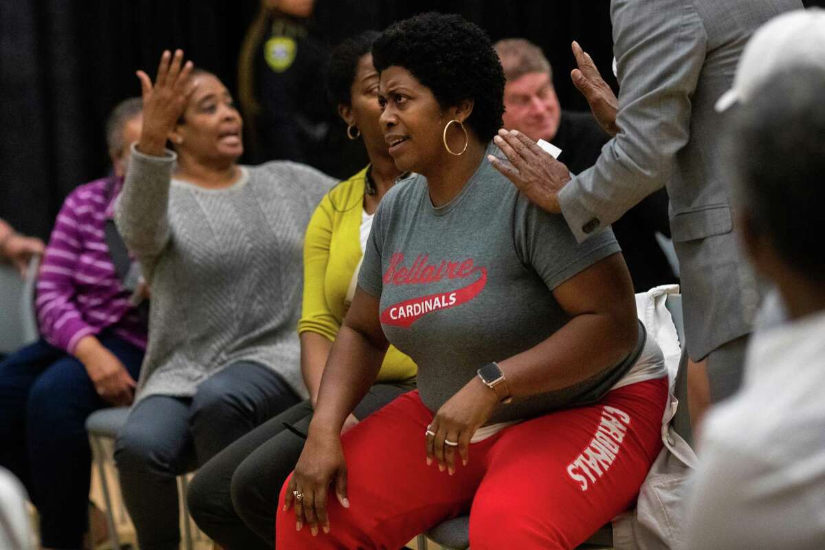 Bellaire High School educator Tania Andrews reacts to remarks made by Gerry Monroe during a forum meeting organized by the NAACP Houston to address the allegations of racism at the high school, Tuesday, April 19, 2022, in Houston. Andrews said she doesn’t want HISD to jump into conclusions and appreciates an investigation being made took look into the allegations.