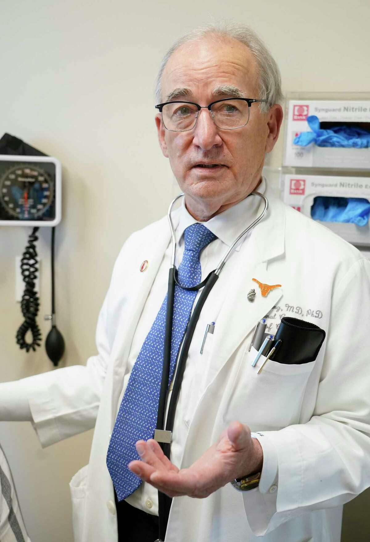 Dr. Richard Smalling, a cardiologist, talks about patient Janna Tarver at UT Physicians, 6410 Fannin St., Wednesday, March 23, 2022, in Houston.