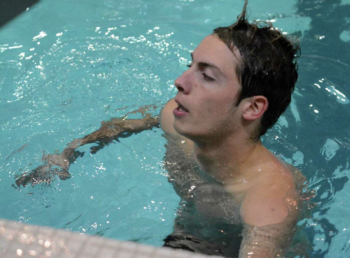 Branford/Guilford’s Corey Gambardella after swimming in the 100 fly at the Class LL championships (Photo Dave Phillips)