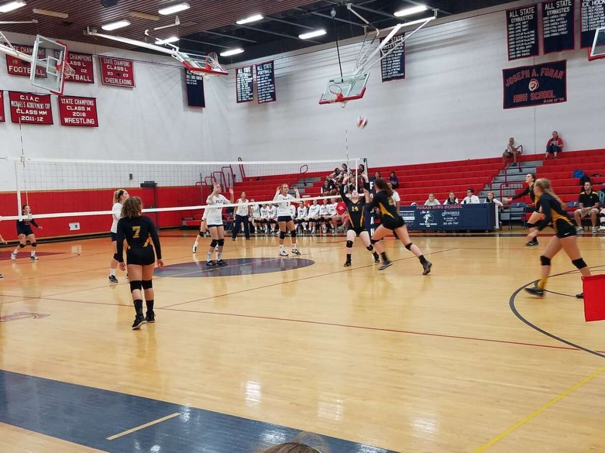 Girls Volleyball: Amity rallies in third to sweep Foran