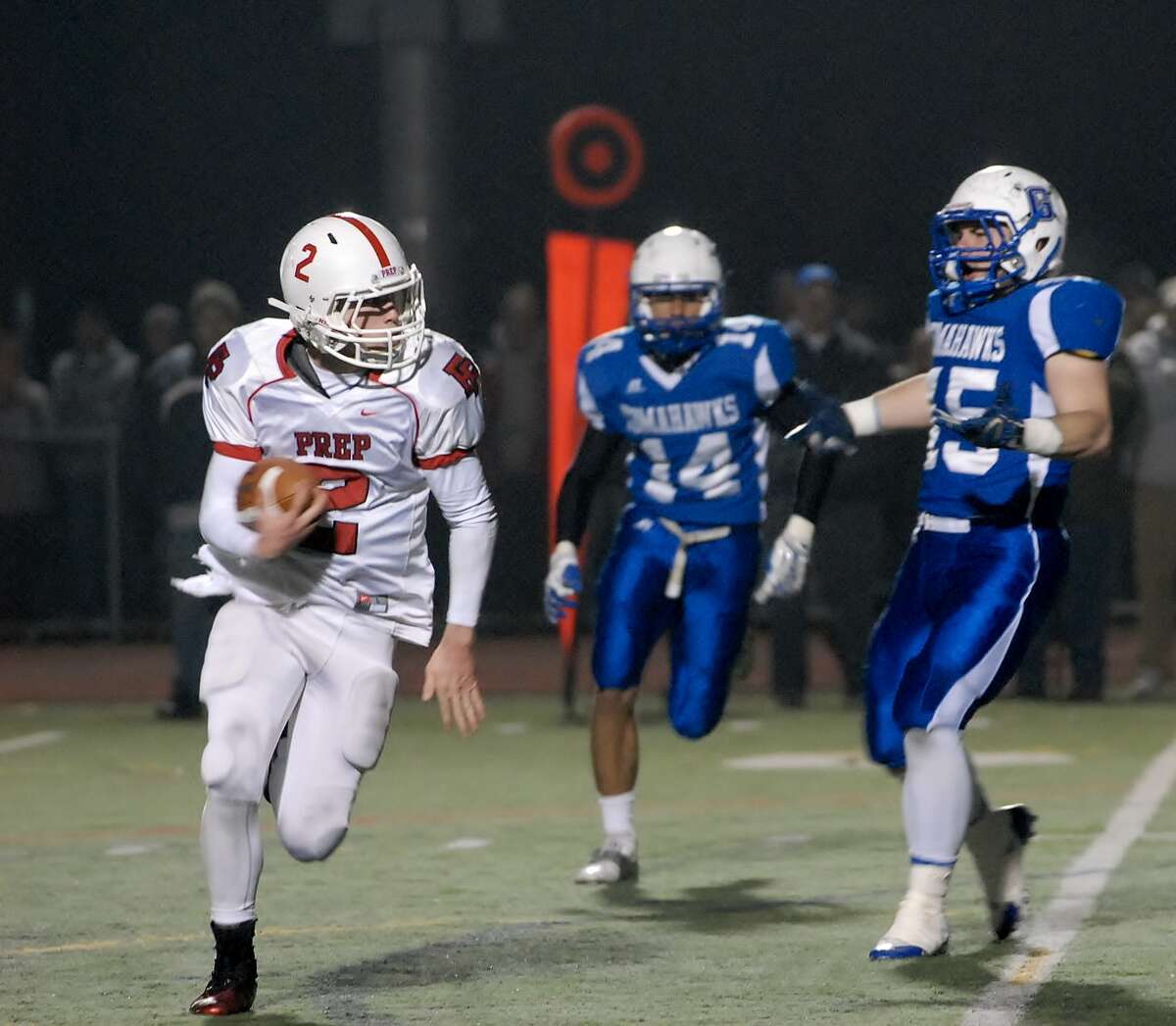 Fairfield Prep’s Colton Smith looks for running room in the Jesuits’ 33-23 victory over Glastonbury in the LL quarterfinals (Mary Albl)