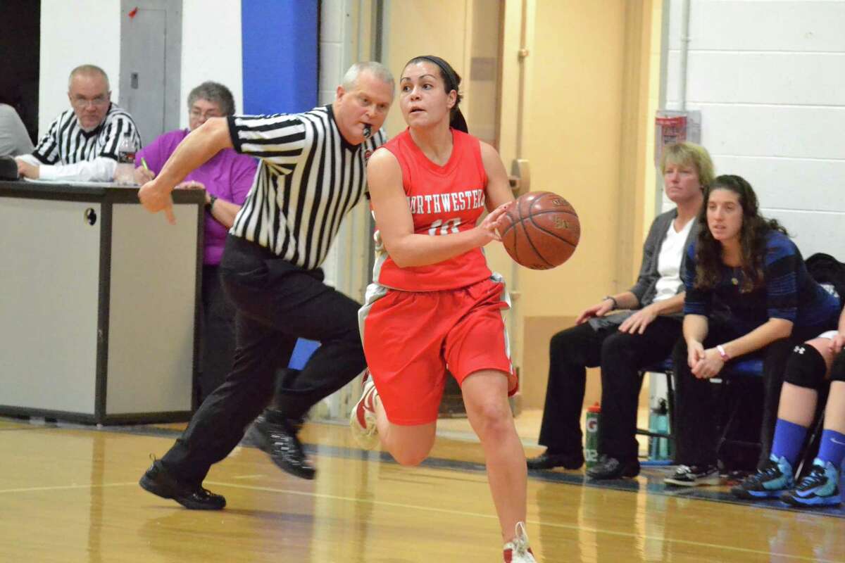 Northwestern’s Liz Newkirk looks to make a pass during the Highlanders 33-16 win over Litchfield. Newkirk finished the game with 11 rebounds and 10 steals.