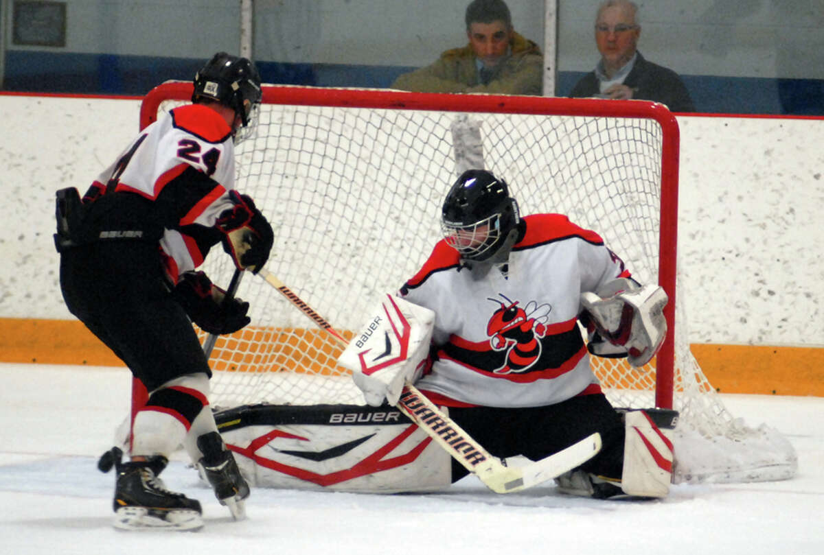 File photo by Dave Phillips/ Branford’s A.J. Brink protects the net against Fairfield Ludlowe during the Division II quarterfinals last year.