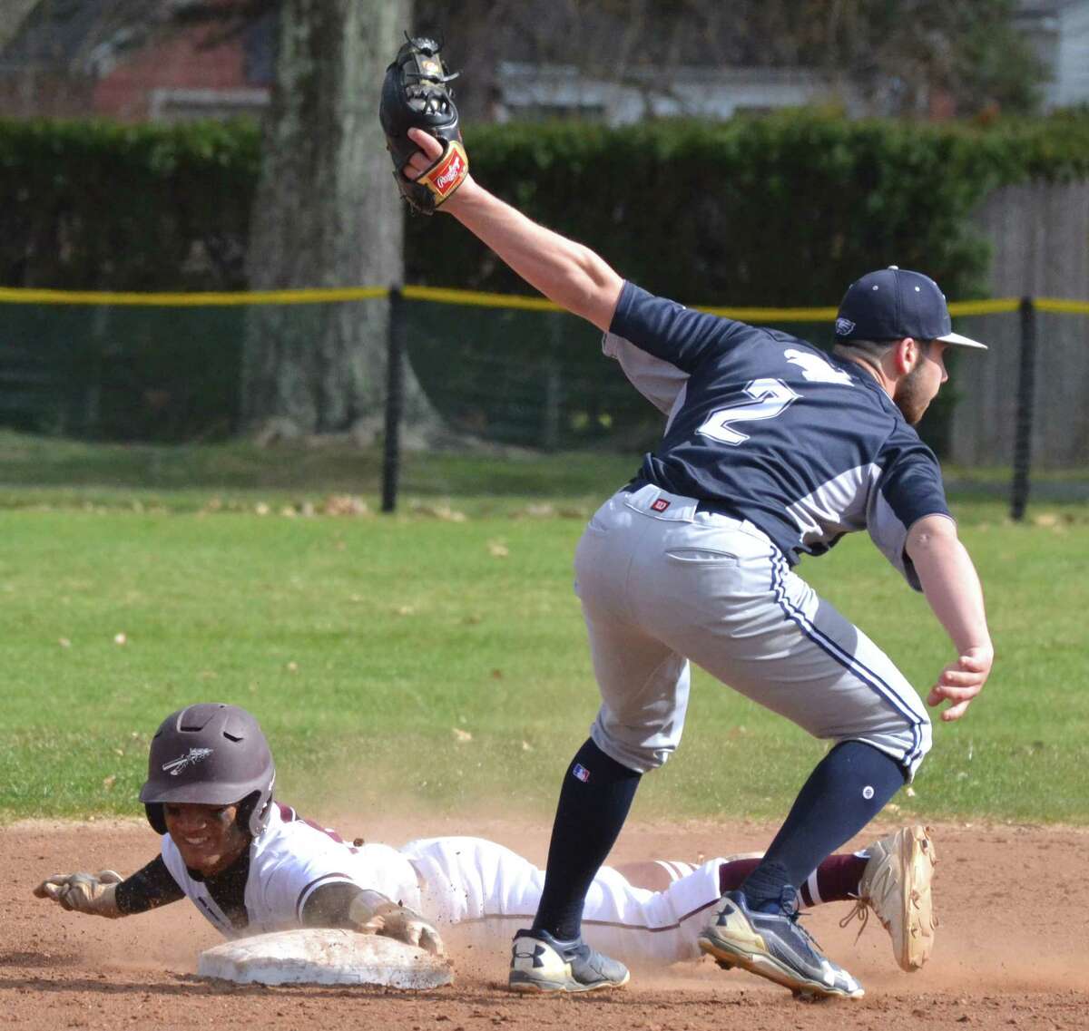 Wethersfield’s Tyler Note tags out Windsor’s Marcus Massa trying to steal second base on Wednesday, April 18, 2018. (Pete Paguaga, Hearst Media Group)