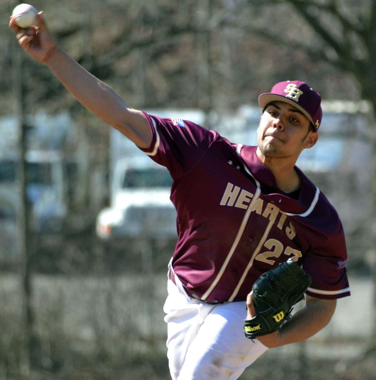 Sacred Heart pitcher Hector Alejandro pitches against Holy Cross on Friday, April 20, 2018.