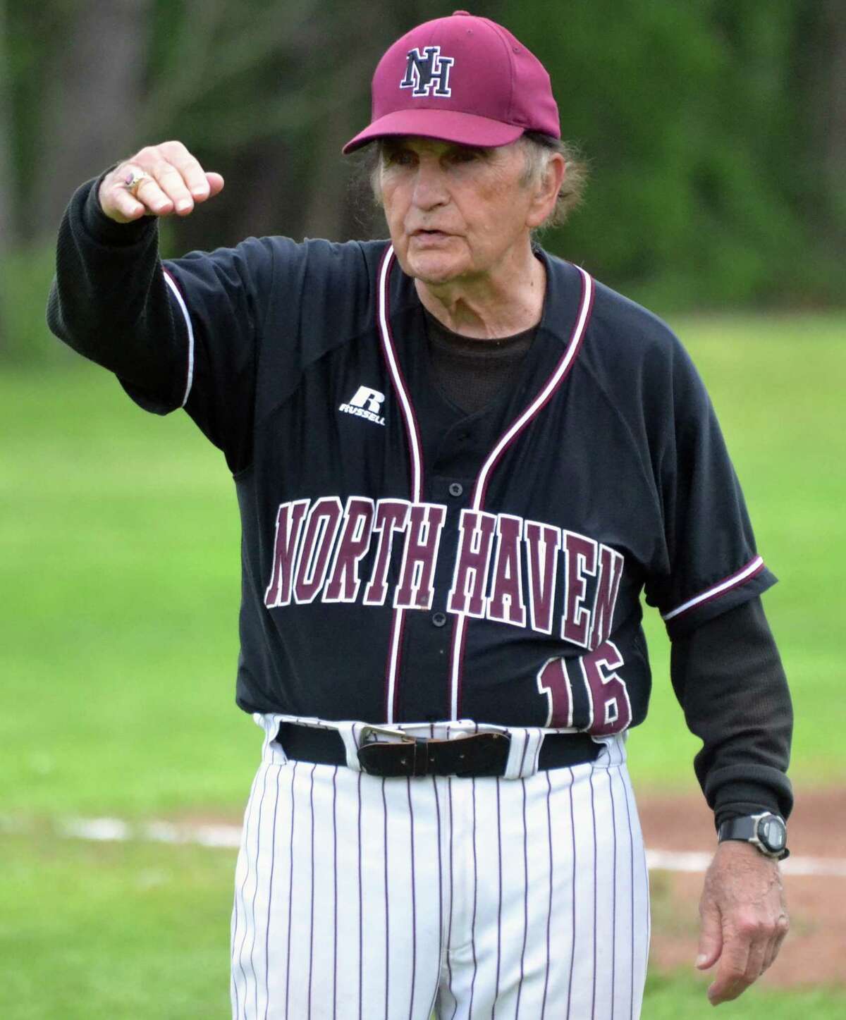 North Haven coach Bob DeMayo speaks to his team against Jonathan Law on Thursday, May 17, 2018. DeMayo is one win away from career win 900. (Pete Paguaga, Hearst Media Company)