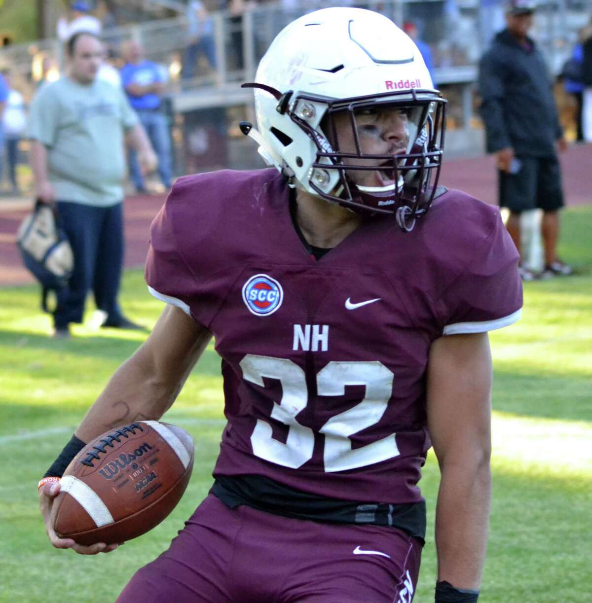 North Haven’s Devan Brockamer celebrates after scoring a two-point conversion during the 14th annual Spring Brawl at North Haven High on June 15, 2018.