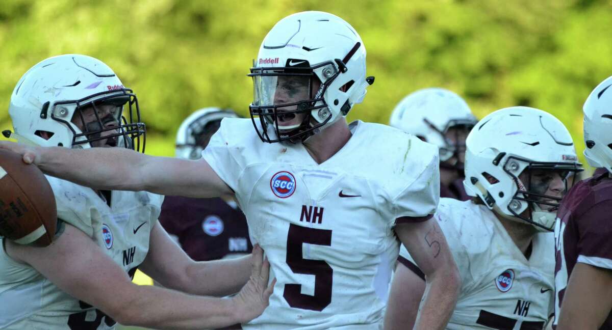 North Haven’s Shamus Meehan celebrates after scoring a touchdown during the 14th annual Spring Brawl at North Haven High on June 15, 2018.
