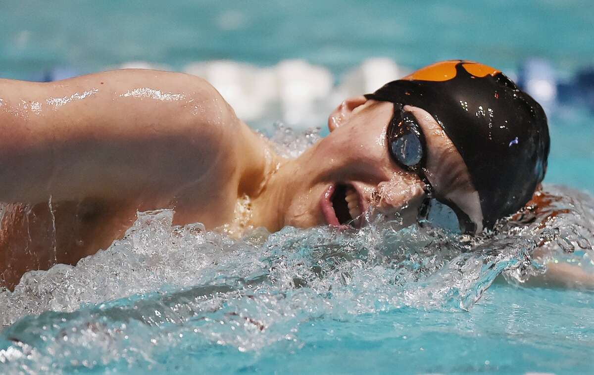 Ridgefield senior Kieran Smith swims the 500 yard freestyle n record-breaking finish of 4:18.83 at the CIAC state open boys swimming championships. Smith earned All-America honors in the event. (Catherine Avalone / Hearst Connecticut Media)