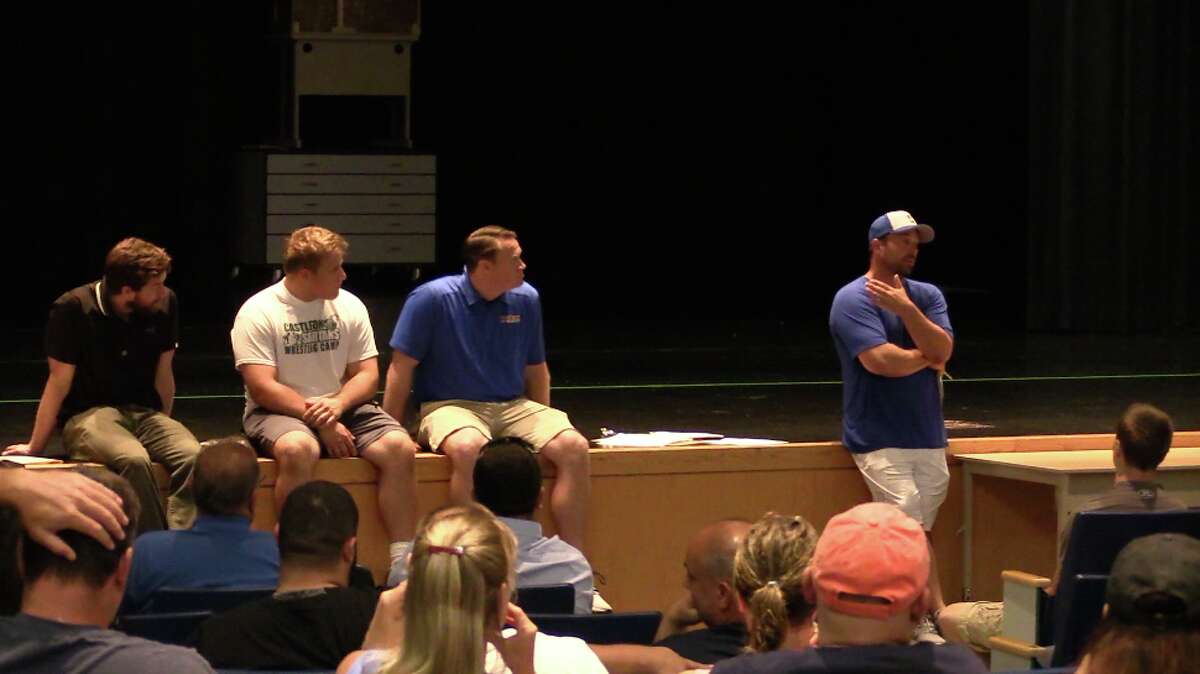 Steve George (right) addresses Seymour football players and their parents at a meeting Tuesday night at Seymour Middle School (Photo Sean Patrick Bowley)