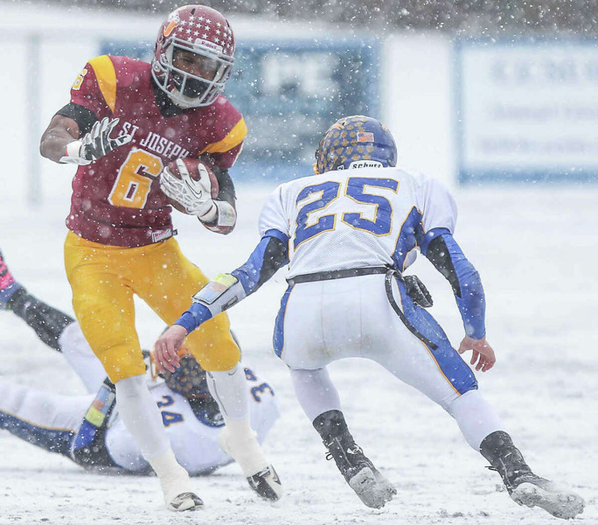 St Joseph’s running back Mufasha Abdul-Basir gains large yardage during the Cadets 54-16 state championship win over Brookfield at CCSU’s Arute field on Dec. 14. The threat of inclement weather for games played deep into December is one of the reasons the CIAC believes the high school football playoff system should change. (Photo John Vanacore)
